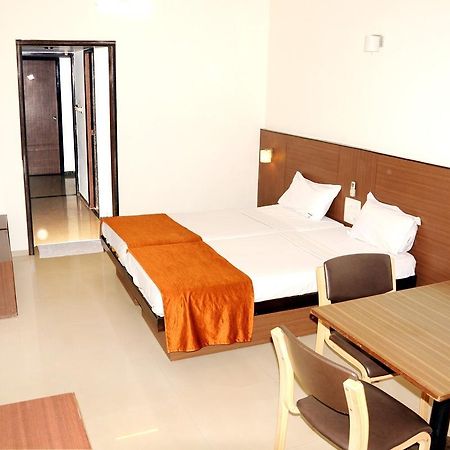 Century Executive Hotel Udupi Bagian luar foto