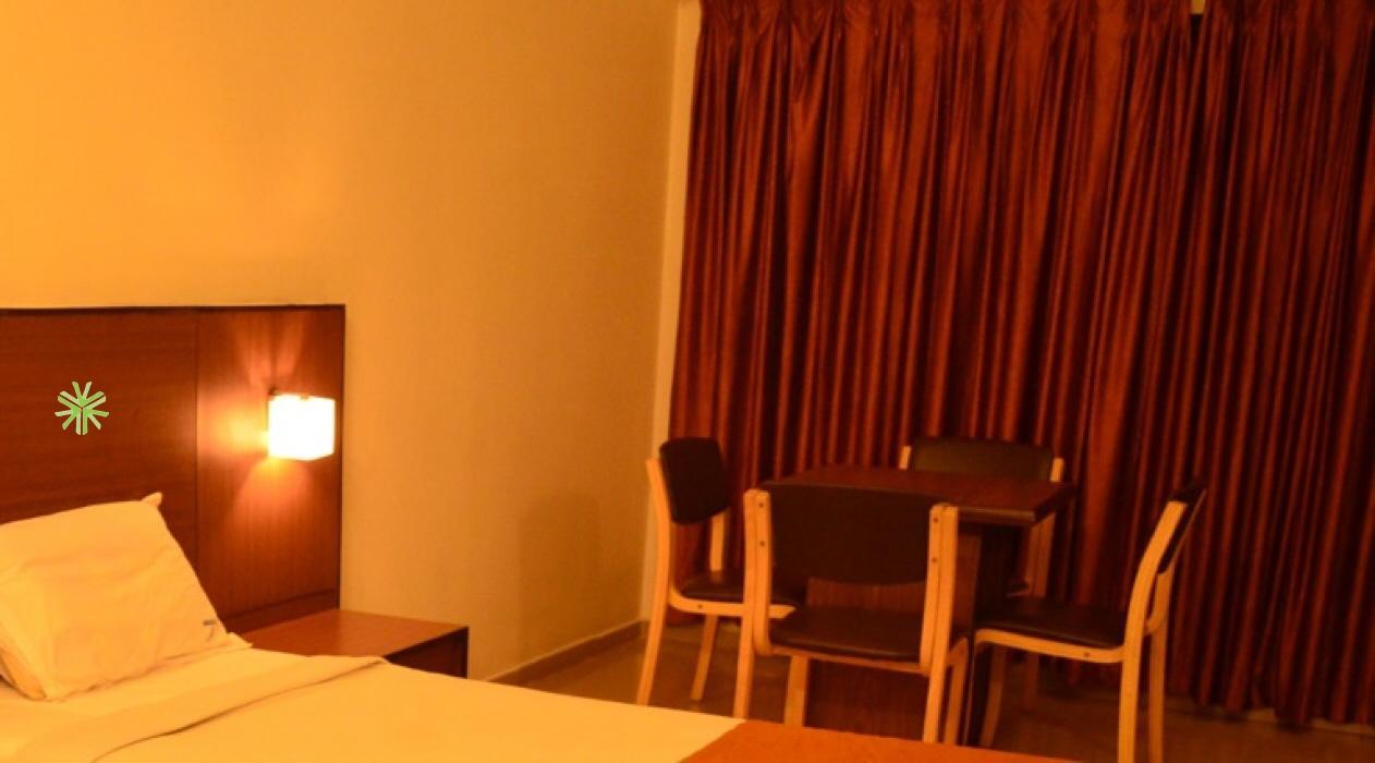 Century Executive Hotel Udupi Bagian luar foto